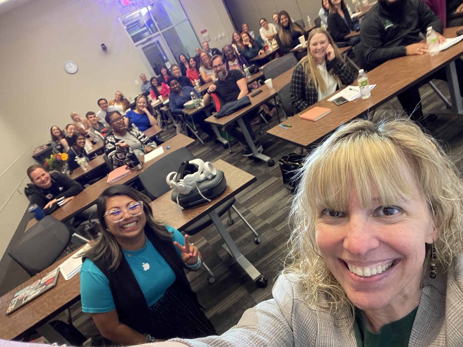 Stephanie with a classroom of participants
